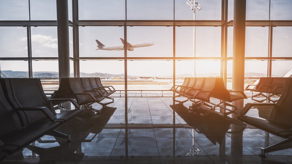 Airport waiting room, flying plane