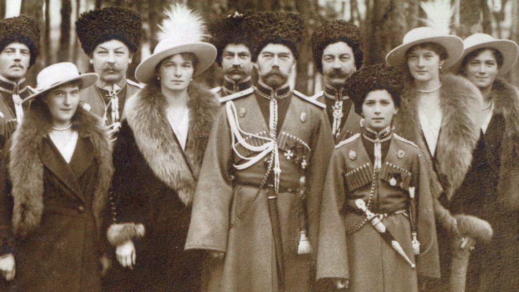 Nicholas_II_and_children_with_Cossacks_of_the_Guard,_cropped