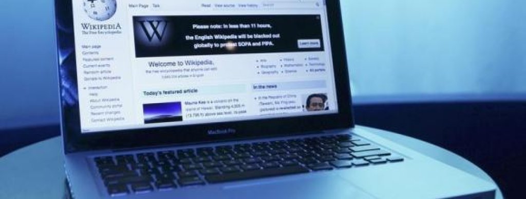 Wikipedia webpage in use on a laptop computer is seen in this photo illustration taken in Washington
