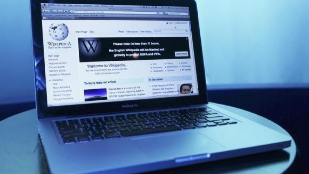 Wikipedia webpage in use on a laptop computer is seen in this photo illustration taken in Washington