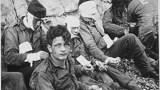 Omaha_Beach_wounded_soldiers,_1944-06-06