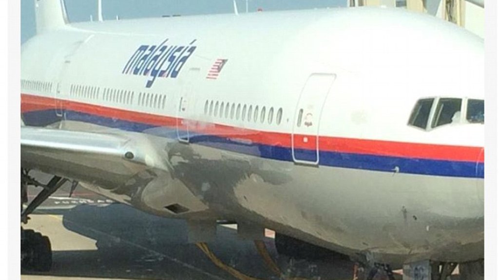 1405617176411_wps_16_Malaysian_Airlines_Plane_