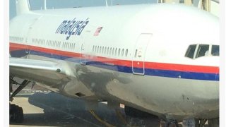 1405617176411_wps_16_Malaysian_Airlines_Plane_