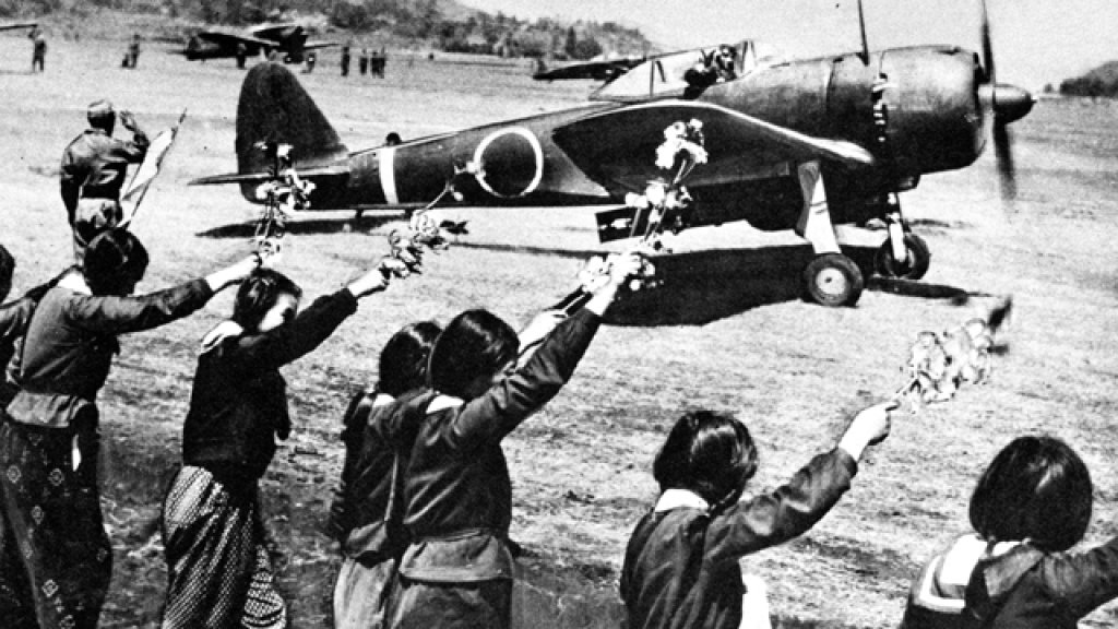 Chiran_high_school_girls_wave_kamikaze_pilot