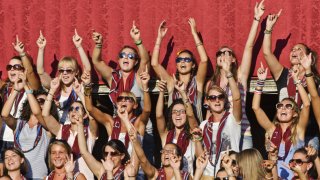 Girls of Torre city neighborhood in Siena are chanting
