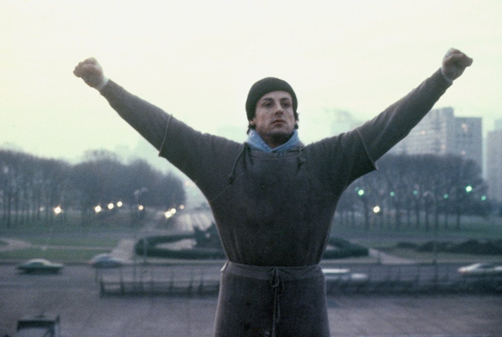„Роки“ (Rocky), 1976 г. 
Носителят на три награди „Оскар“ е една от най-големите класики в посртните филми. В нея ставаме свидетели как аутсайдерът Роки Балбоа стига до мач за световната титла. „Нашият човек“ Силвестър Сталоун все пак губи от Аполо Крийд (в ролята Карл Уедърс, за когото интересното е, че е бивш играч по американски футбол), но печели в друг аспект, тъй като може да се бие, докато любовта на живота му – Ейдриън (Талия Шайър), е до него. Впоследствие вселената на „Роки“ става огромна със следващите филми, но първият си остава вечен.