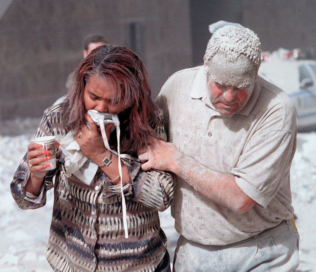 1190px-Dust_covered_911_victims