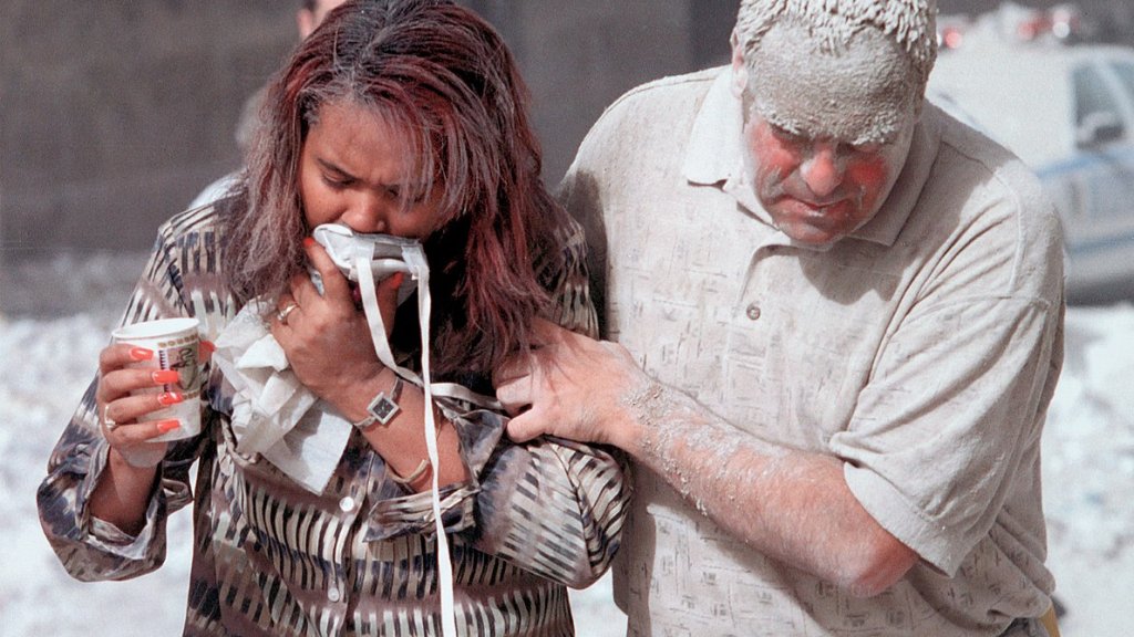 1190px-Dust_covered_911_victims