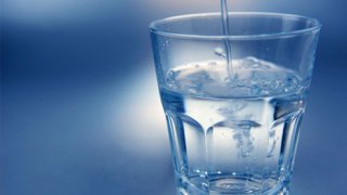 istock_photo_of_pouring_water_into_glass